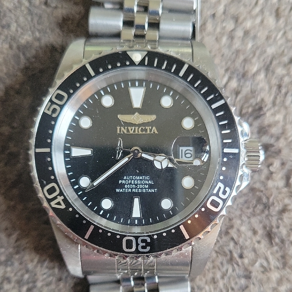 Invicta Black and Silver Professional Watch